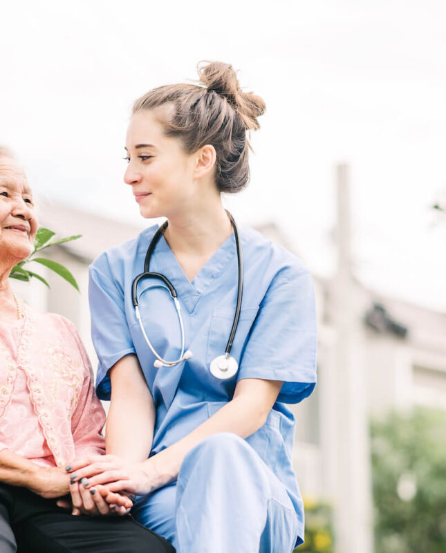 Assisted living senior community caregiver and resident