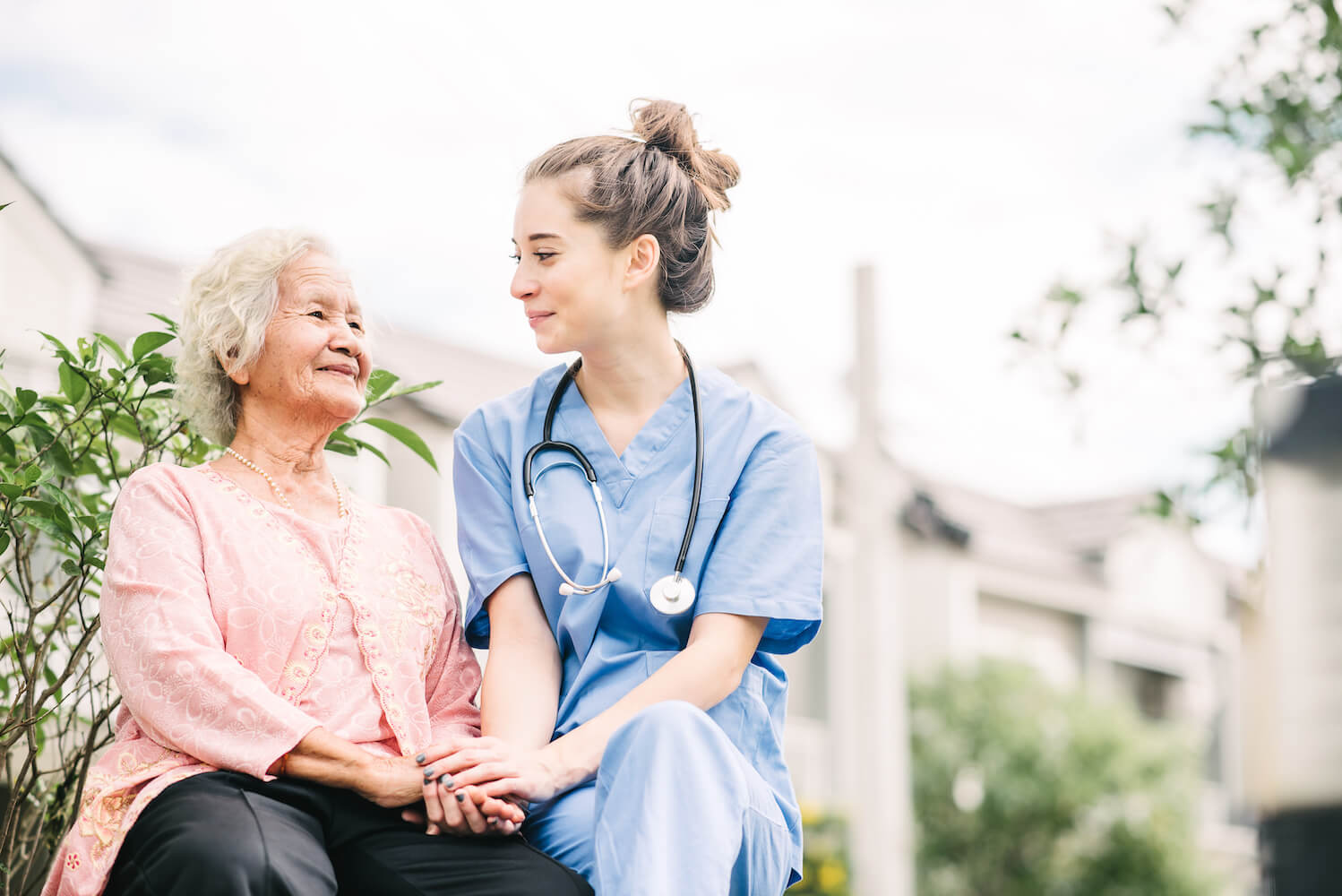 Assisted living senior community caregiver and resident