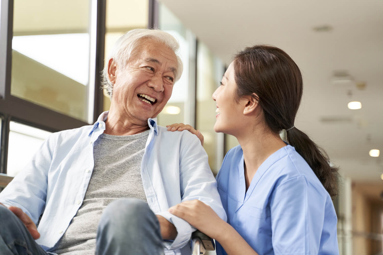Caregiver and resident smiling